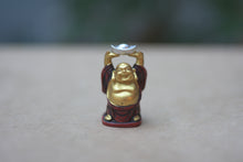 Load image into Gallery viewer, Red and Gold Resin Buddha Statue
