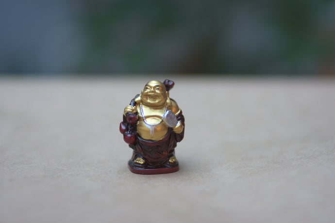 Red and Gold Resin Buddha Statue